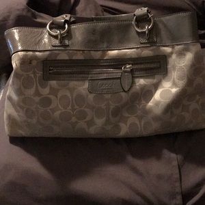 Grey coach purse. In good condition.
